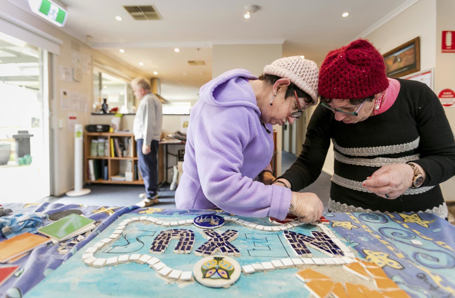 Elderley, aged care, women making mosaics