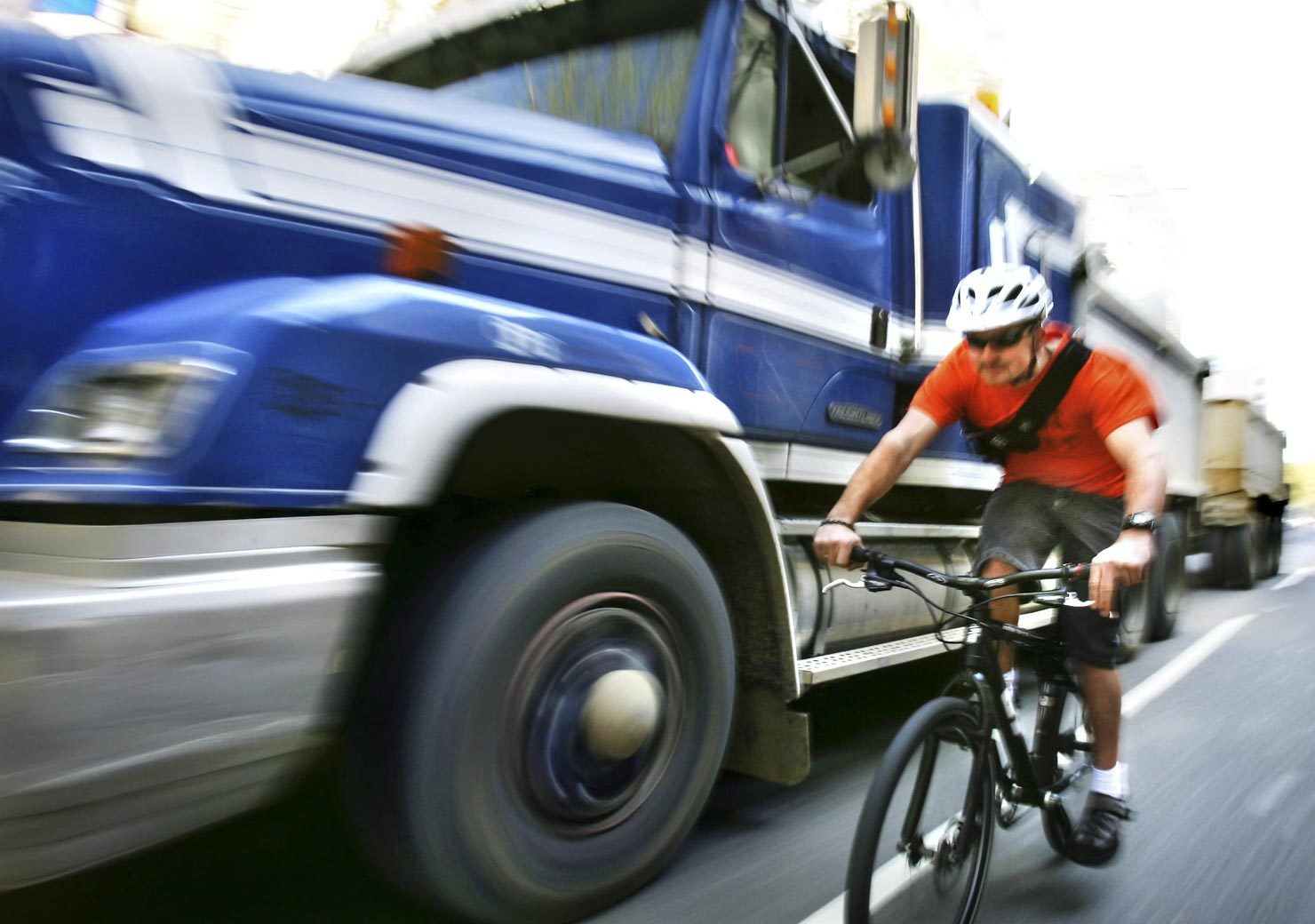 Cyclist being overtaken dangerously be a truck